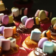 Mini cup cakes with nutella and caramel and topped with mini sweets
